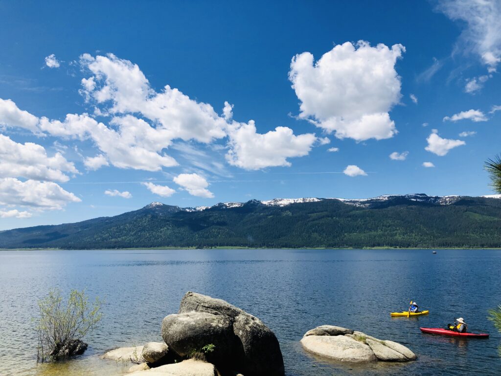 Kayakers paddling Cascade Lake